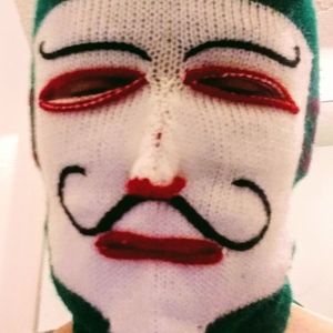 Hand knitted devil's mask
